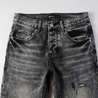 Lila-graue zerrissene Jeans