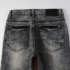Lila-graue zerrissene Jeans