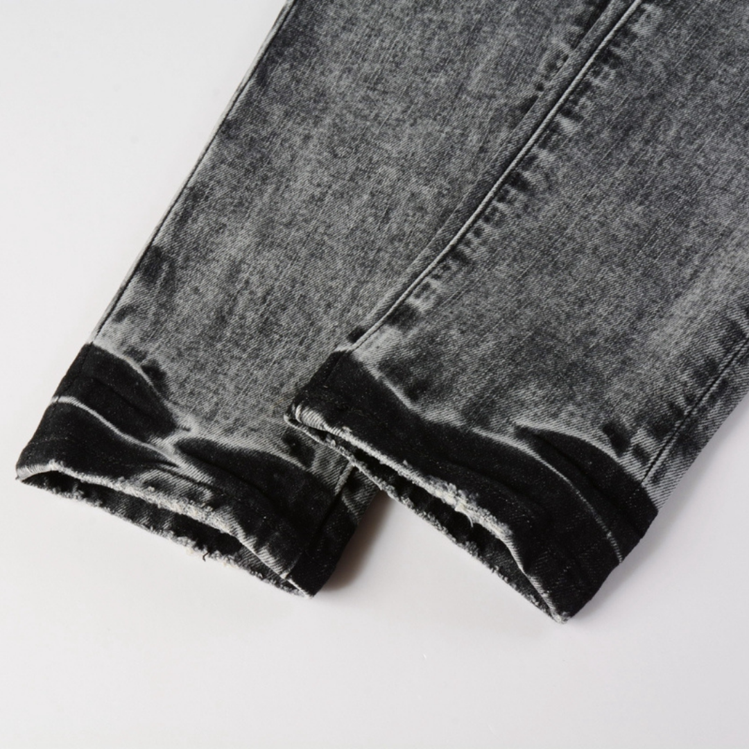 Lila-graue zerrissene Jeans