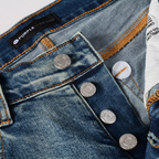 Lila zerrissene Jeans