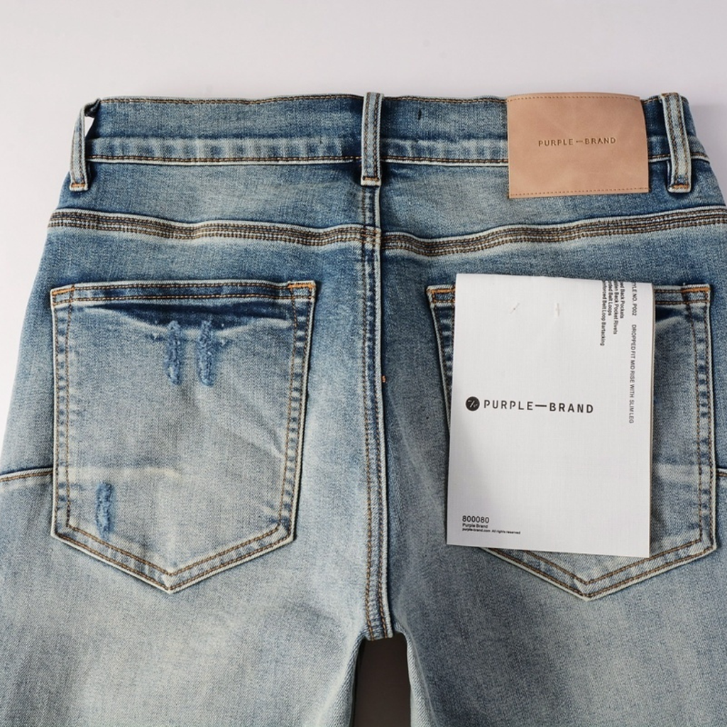 Lila zerrissene Jeans