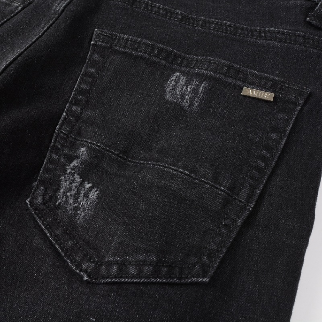 Amr Jeans mit Farbklecksen