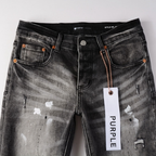 Lila zerrissene Jeans