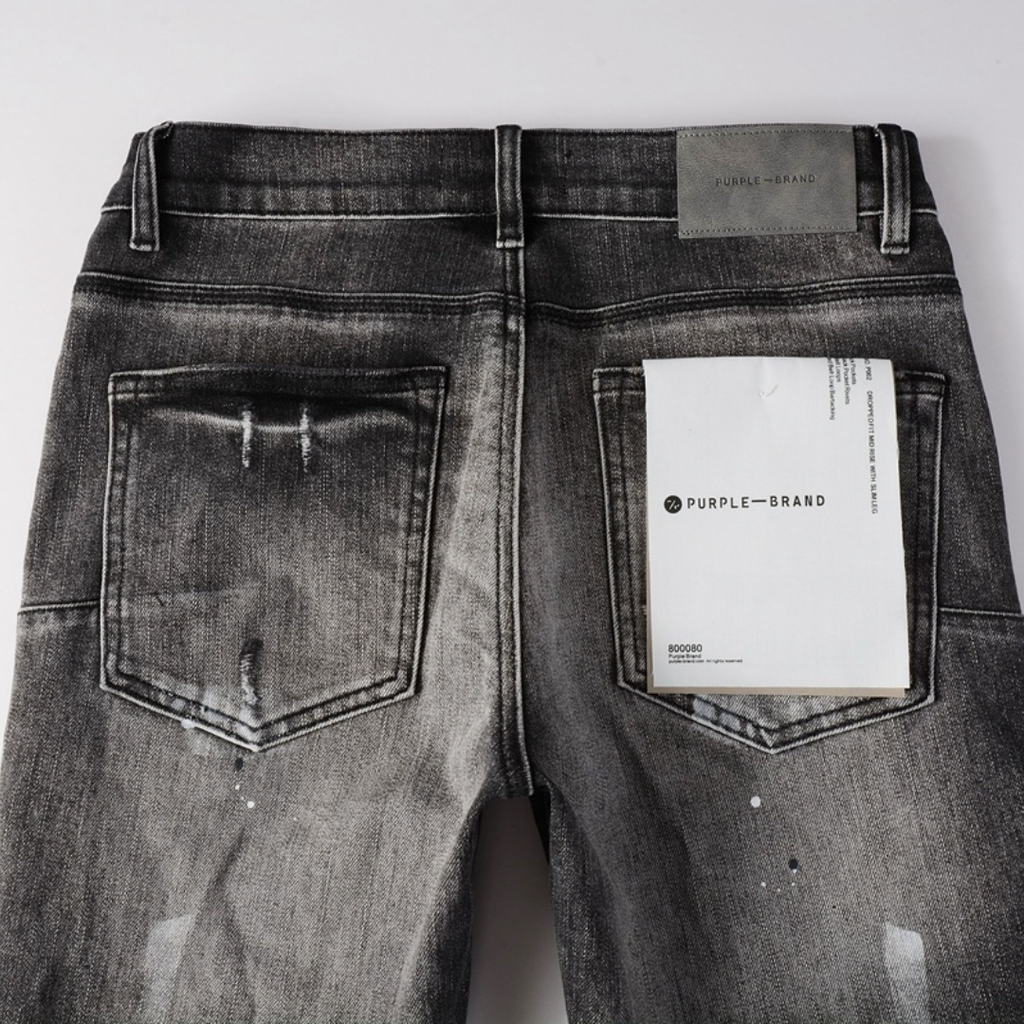 Lila zerrissene Jeans