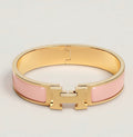 PINKES BUCHSTABENARMBAND