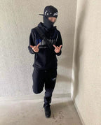 Secret Decoded 2.0 Schwarzer Trainingsanzug